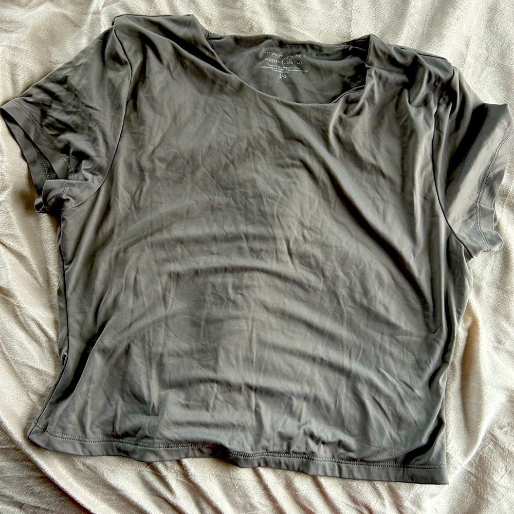 Grey dry fit women’s workout top or casual wear with leggings for a sporty look